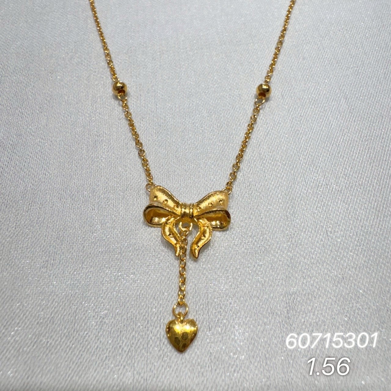 9999純金蝴蝶結愛心項鍊 · 9999 純金金飾 · 金閃閃銀樓